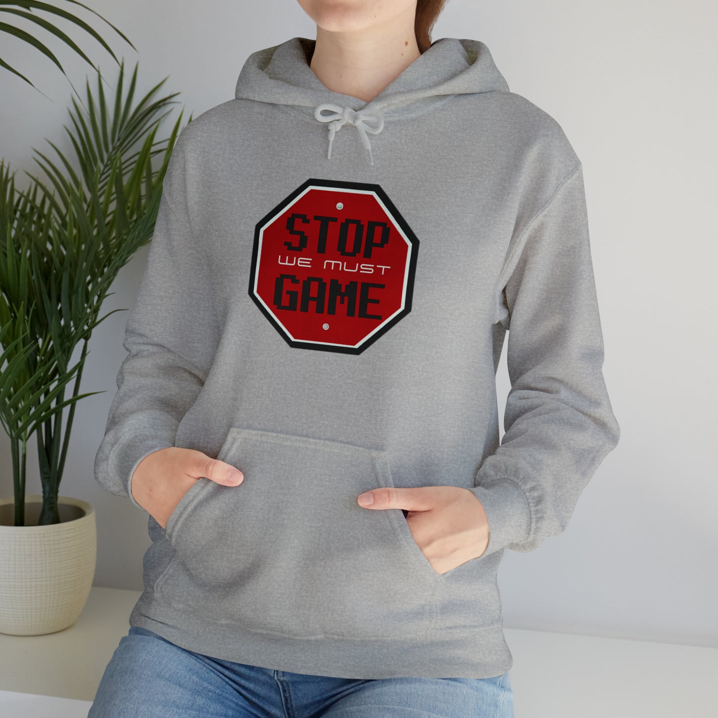 Stop we must game Unisex Heavy Blend™ Hooded Sweatshirt