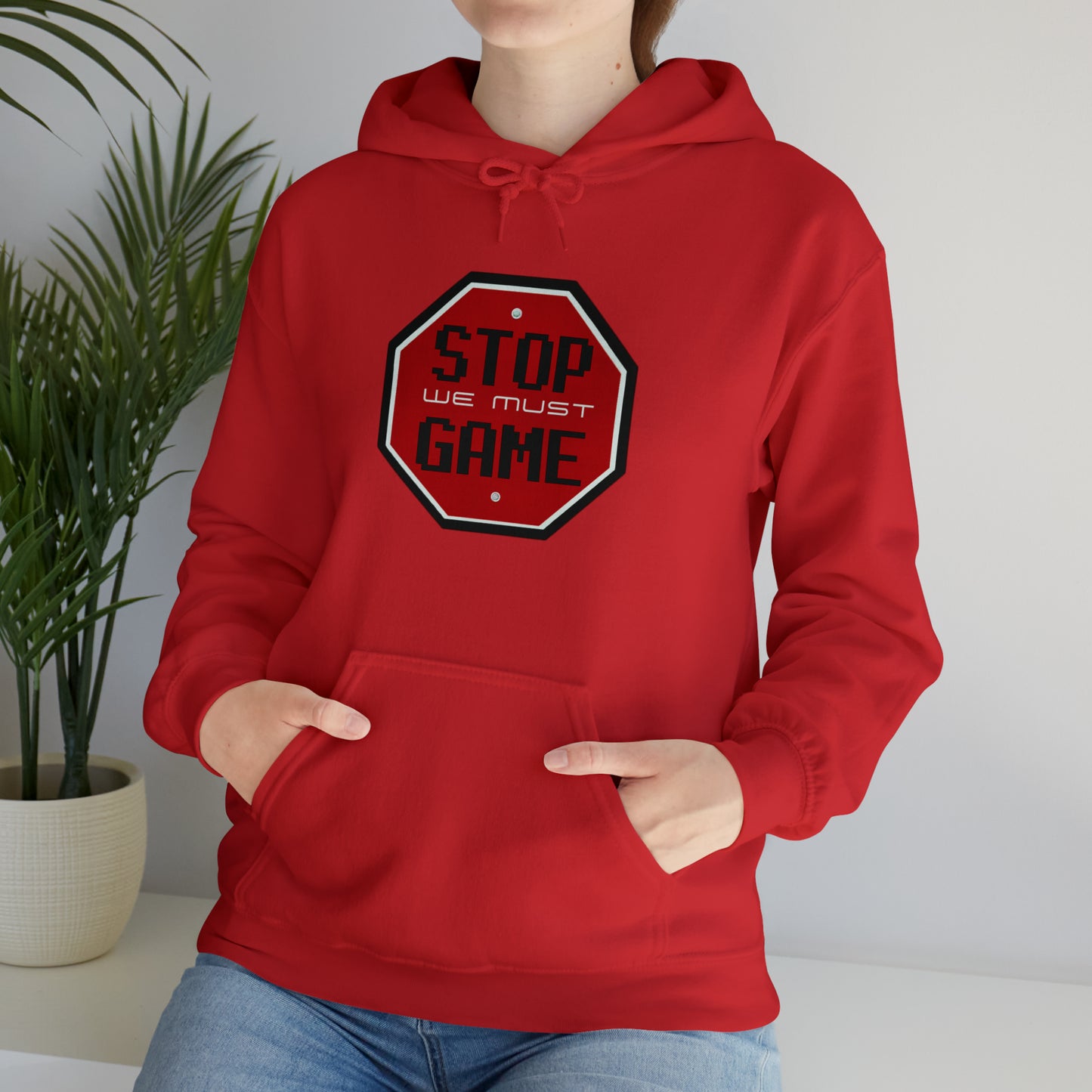 Stop we must game Unisex Heavy Blend™ Hooded Sweatshirt