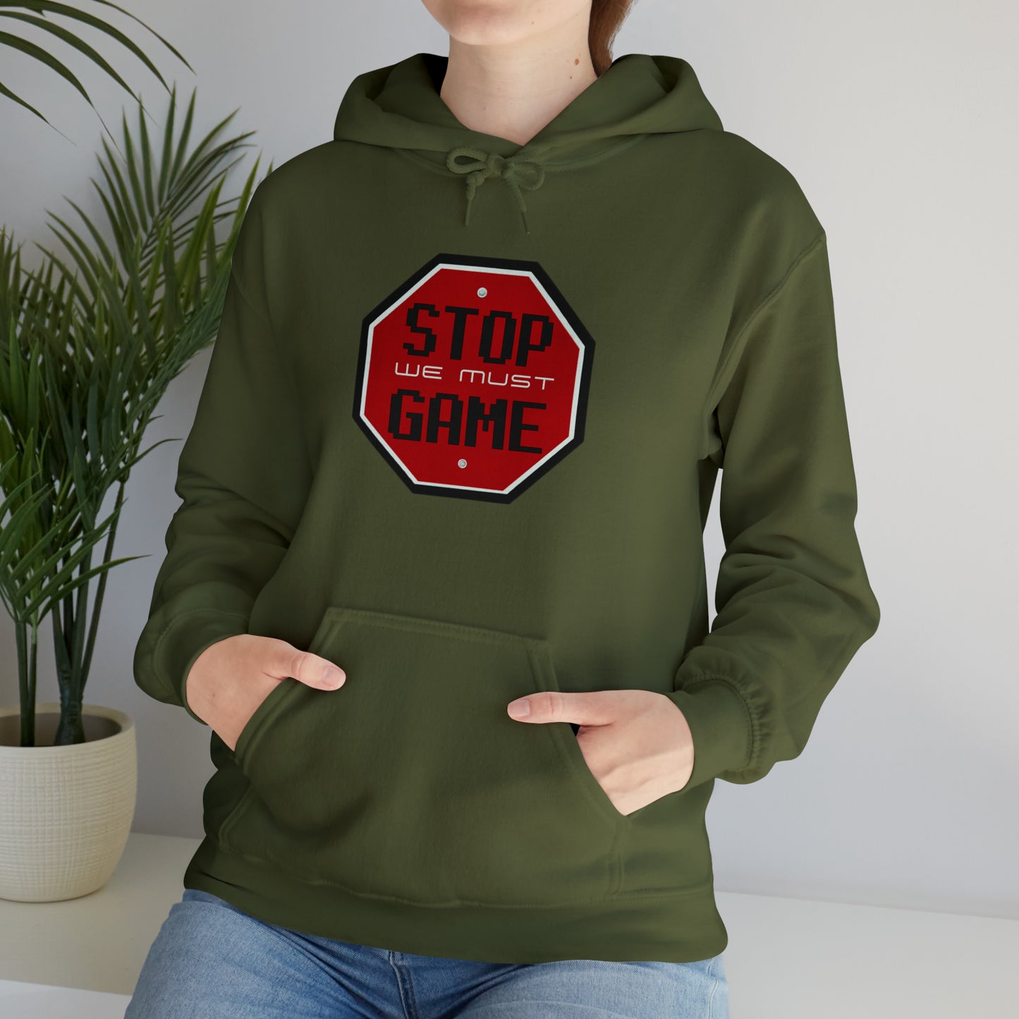 Stop we must game Unisex Heavy Blend™ Hooded Sweatshirt