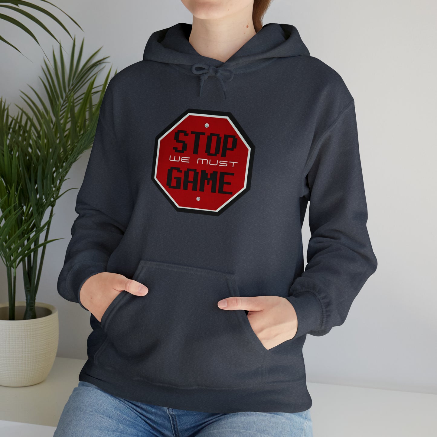 Stop we must game Unisex Heavy Blend™ Hooded Sweatshirt